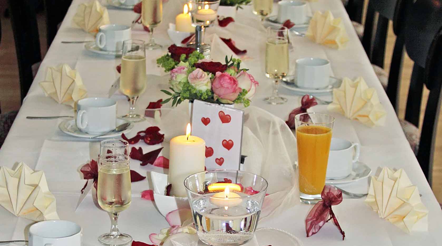 Wedding table setting with candles.